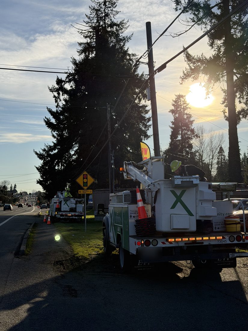 Bucket truck crews doing aerial line work